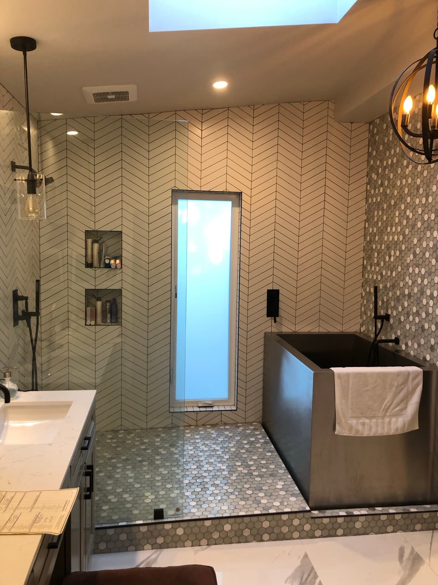 Custom Herringbone Tile Bathroom